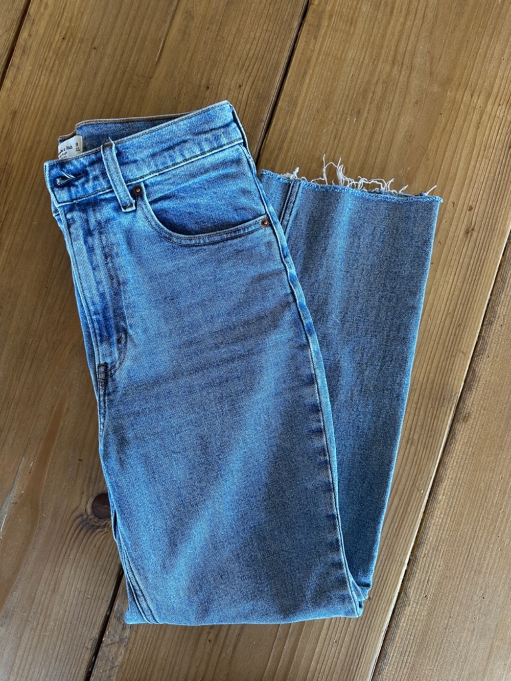 Abercrombie The Ankle Straight Jean. Light wash. Raw hem.